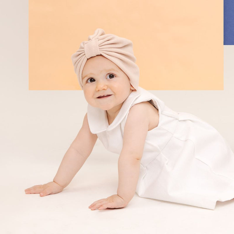 Bonnet esprit turban bébé fille en maille imprimée - beige poudré